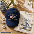 The American Grace Sisterhood Game Set Grace Magnolia Lane Club Embroidered Cap in Heritage Navy paired with matching SW3 Crewneck on warm white oak table