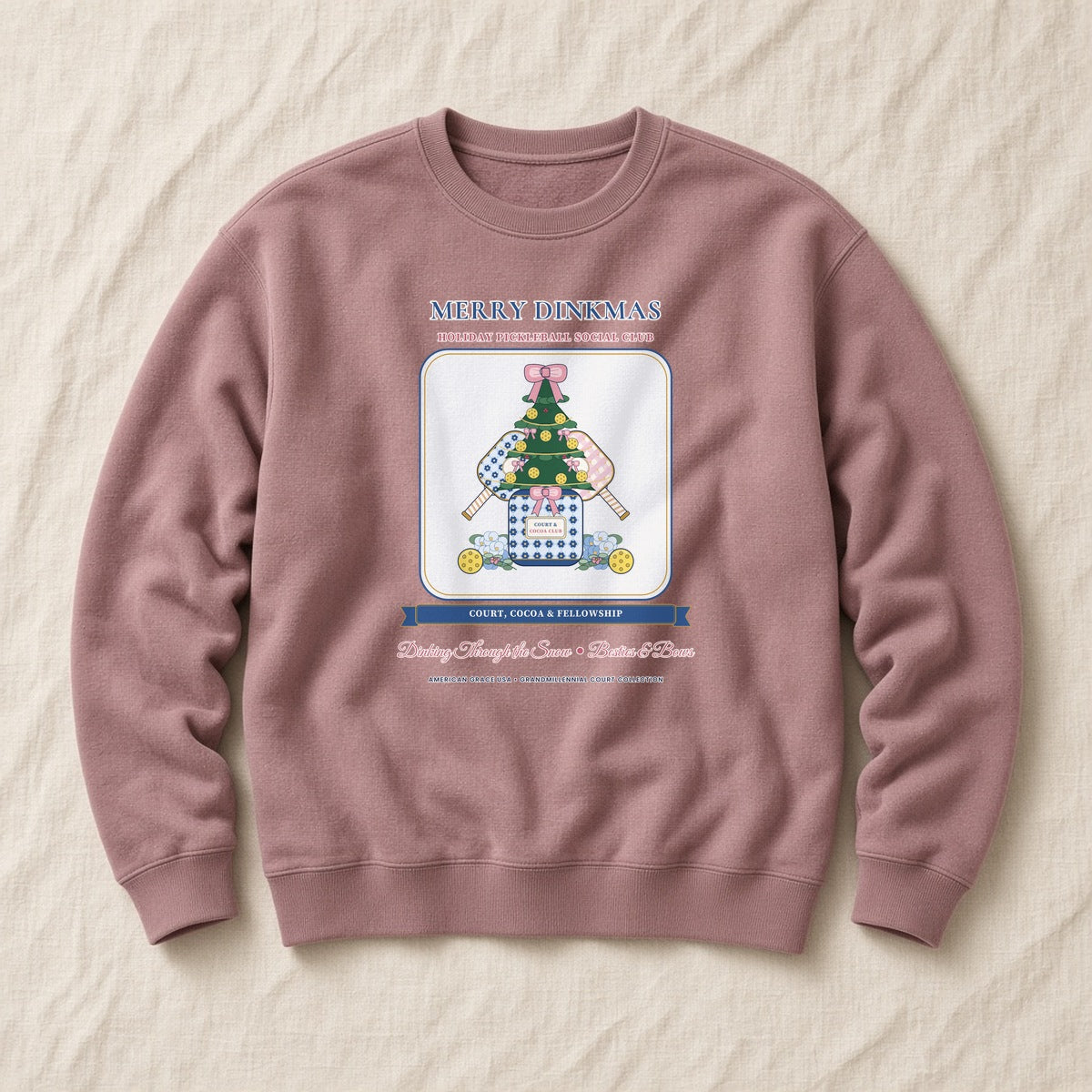 Merry Dinkmas Court & Cocoa Club Sponge Fleece Sweatshirt in Mauve Blush Flat-Lay | American Grace USA