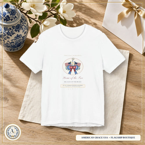 "American Grace • Home of the Free, Because of the Brave" Preppy Toile Ribbon & Flag Bella+Canvas Boutique Tee — American Grace USA Flagship Boutique