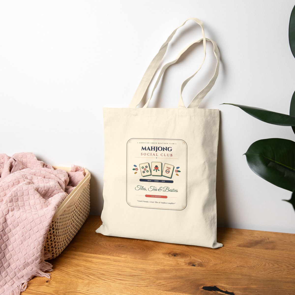 Mahjong Social Club Canvas Tote Bag Boutique Lifestyle Flat-Lay — Tiles Tea & Besties Game Night Bag by AmericanGraceUSA